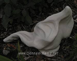Slinky.jpg - 18cm High, 20cm Wide , 14cm Deep 
Fired clay sculpture